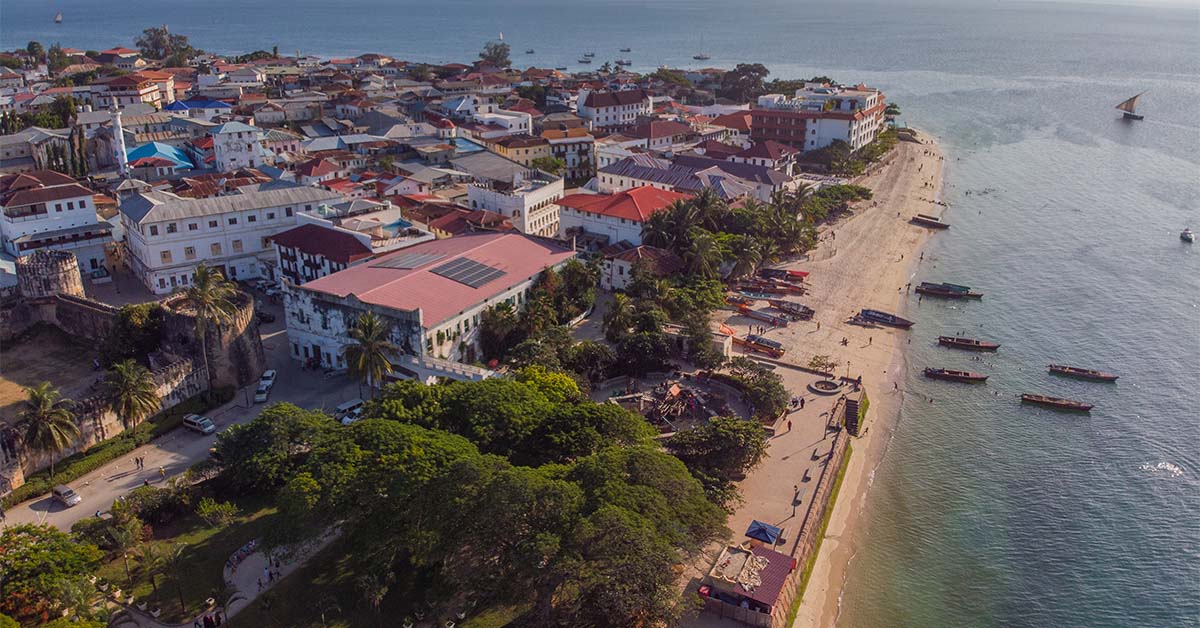 On the west, the capital city of Zanzibar awaits to show you the narrow streets and alleys, the coral stone architecture, the carved doors and many other secrets.